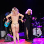 Niki Luparelli with burlesque dancer and all woman Led Zep tribute band